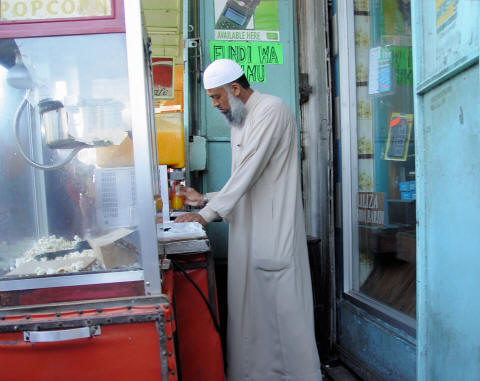 CLICK HERE - Bin Laden's Popcorn and OJ Stand