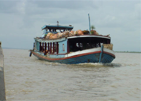 Fellow freighter boat on Ayeryarwady River. - CLICK FOR FULL-SIZE PHOTO