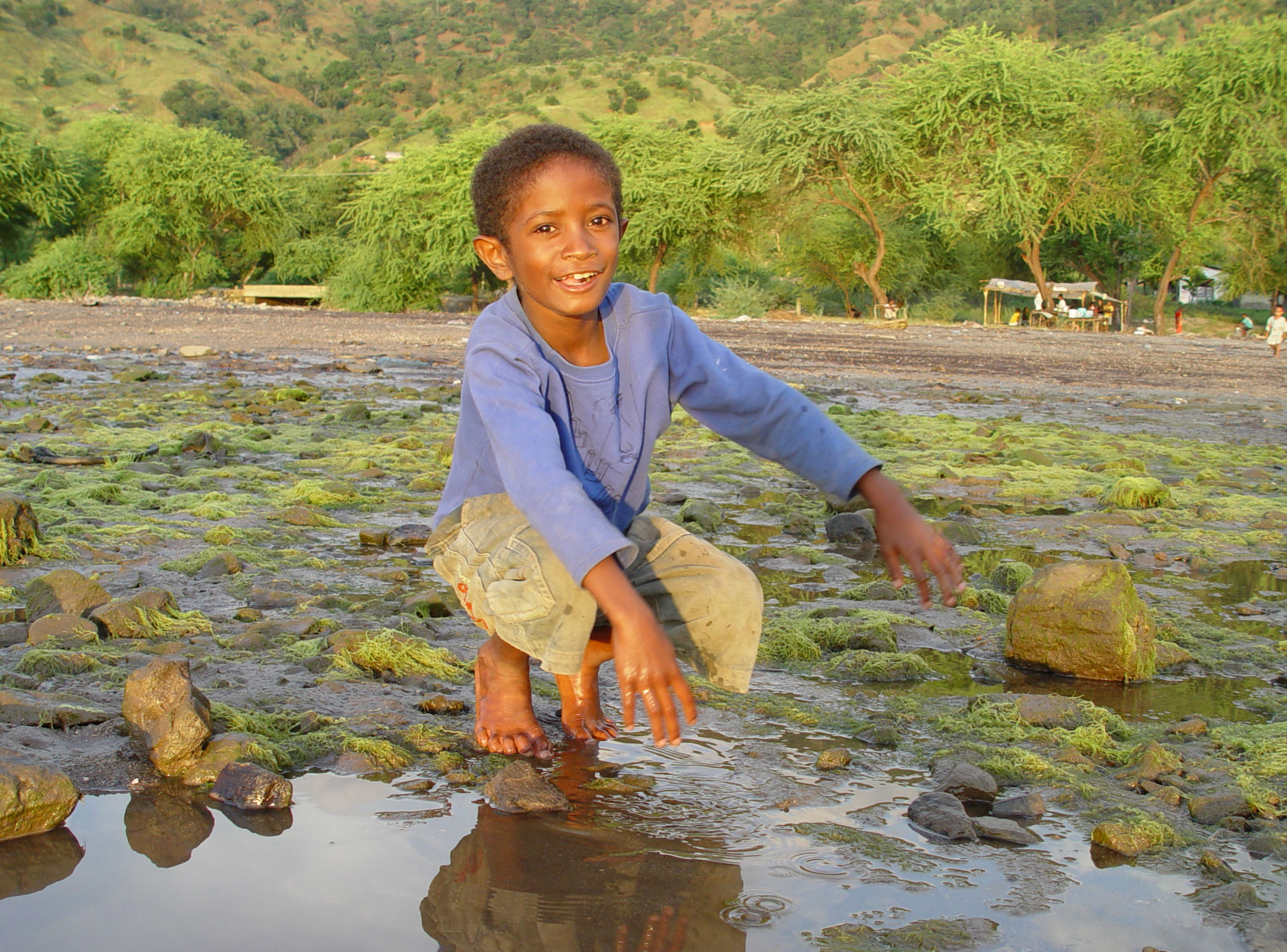 CLICK HERE - Boy on tidal flats